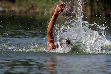 Image showing The swimming person