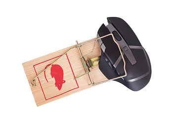 Image showing Modern computer mouse in a mousetrap