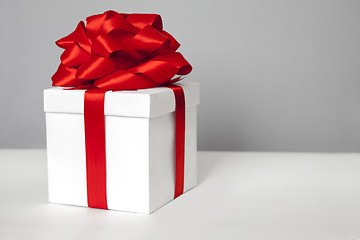 Image showing gift box with red ribbon bow