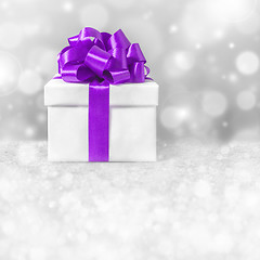 Image showing gift box with purple ribbon bow