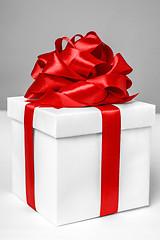 Image showing gift box with red ribbon bow