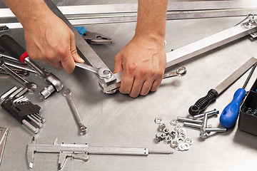 Image showing Metal work tools, steel parts. 