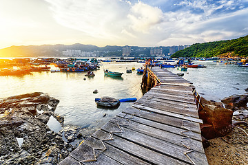 Image showing Boat pier at sunset. Beautiful landscape. 