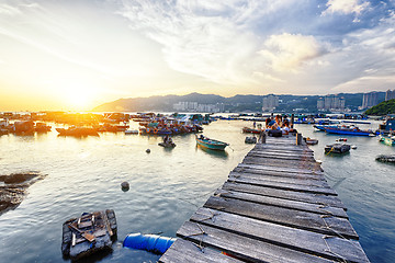 Image showing Boat pier at sunset. Beautiful landscape. 