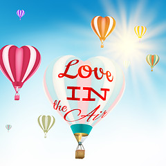 Image showing Couple in hot air hearts balloons. EPS 10