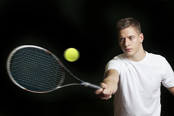 Image showing Young man playing tennis