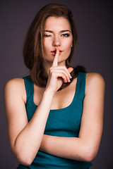 Image showing Woman making hush gesture