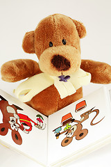 Image showing Teddy bear reading