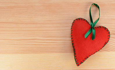 Image showing Heart-shaped felt decoration with green ribbon 