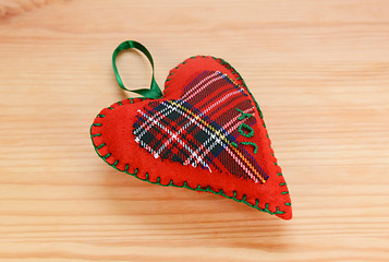 Image showing Handmade red plaid heart-shaped festive ornament