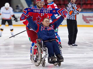 Image showing Disabled fan on wheelchair