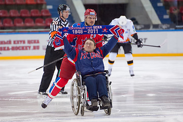 Image showing Disabled fan on wheelchair