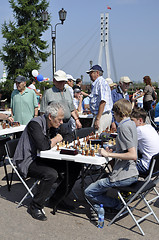 Image showing Chess tournament on the street in the summer.