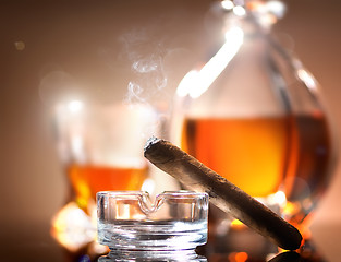 Image showing Cigar on ashtray