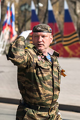 Image showing Army captain salutes on Victory Day parade