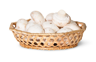 Image showing Mushrooms Champignon In A Wicker Basket
