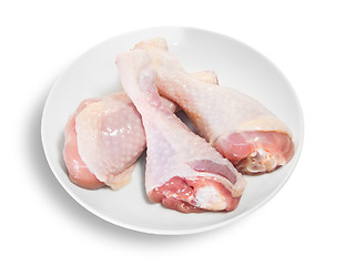 Image showing Three Raw Chicken Legs On White Plate