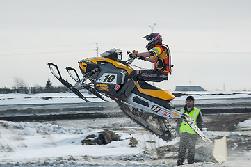 Image showing Snowmobile rider on sport track