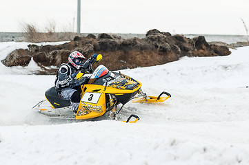 Image showing Snowmobile moves on bend of sport track