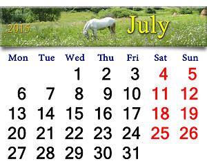 Image showing calendar for July of 2015 with horse in field