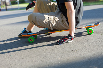 Image showing Longboarder Sitting