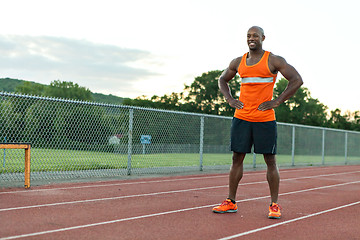 Image showing Track and Field Runner Smiling