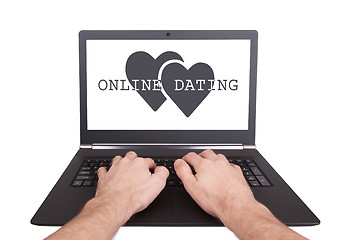 Image showing Man working on laptop, online dating