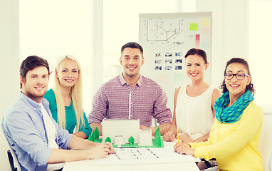 Image showing smiling architects working in office