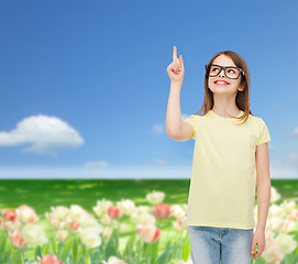 Image showing smiling cute little girl in black eyeglasses