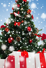 Image showing close up of christmas tree and presents