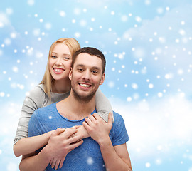 Image showing happy couple hugging outdoors