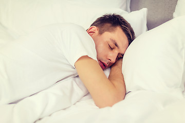 Image showing handsome man sleeping in bed