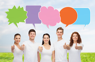 Image showing group of smiling teenagers with text bubbles