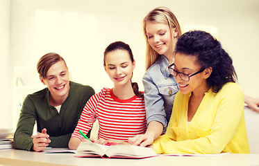 Image showing students with textbooks and books at school