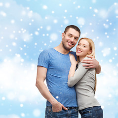 Image showing happy couple hugging outdoors