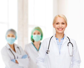 Image showing smiling female doctor with stethoscope