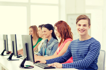 Image showing male student with classmates in computer class