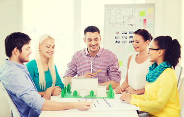 Image showing smiling architects working in office