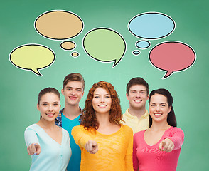 Image showing group of smiling teenagers with text bubbles