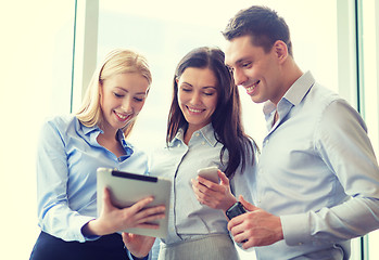 Image showing business team working with tablet pcs in office