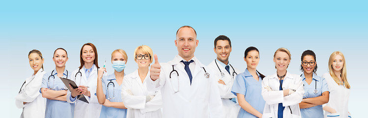 Image showing group of smiling doctors with showing thumbs up