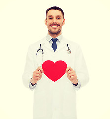 Image showing smiling male doctor with red heart