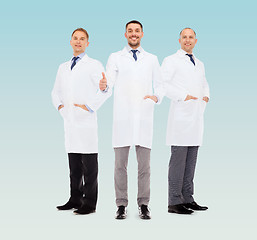 Image showing smiling male doctors in white coats