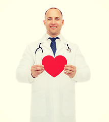 Image showing smiling male doctor with red heart