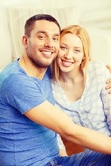 Image showing smiling happy couple at home