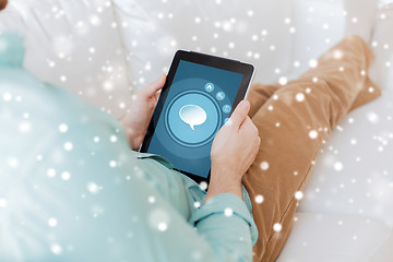 Image showing close up of man with tablet pc computer at home