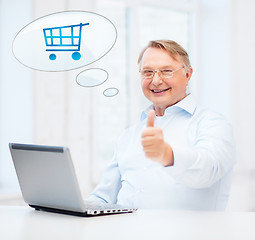 Image showing old man with laptop computer showing thumbs up