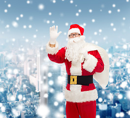 Image showing man in costume of santa claus with bag