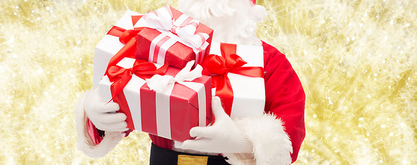 Image showing close up of santa claus with gift box