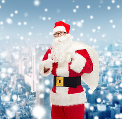 Image showing man in costume of santa claus with bag